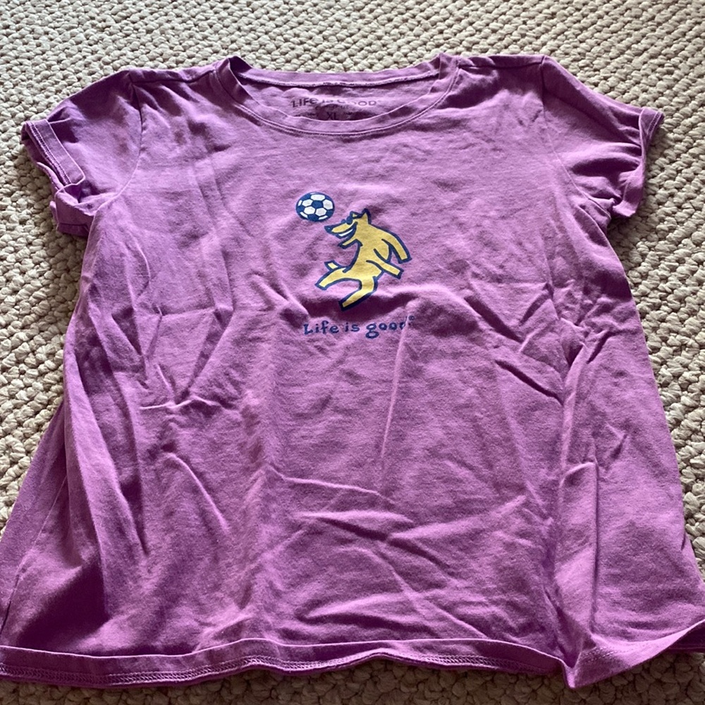 This is never worn shirt that is so cute